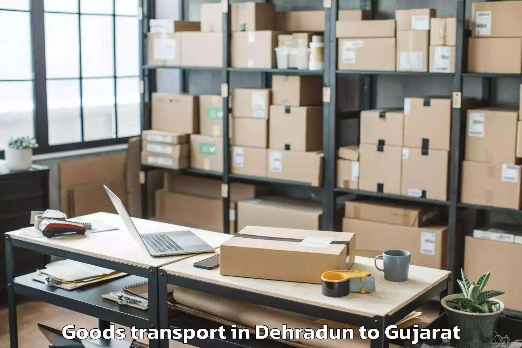 Book Dehradun to Sarkhej Goods Transport